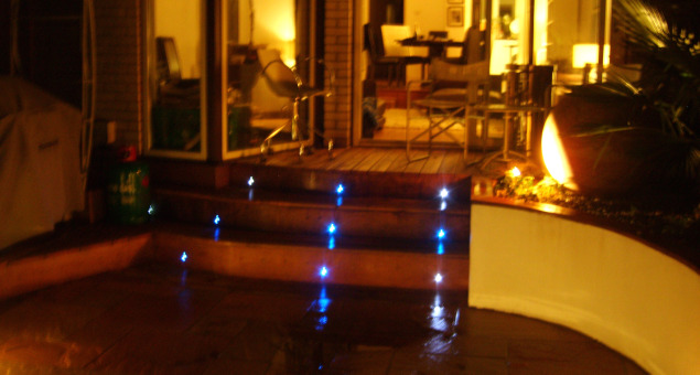 The decking steps are picked out by blue LED lights both for safety and for effect.