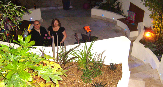 Our clients wanted a contemporary outside space that they could use for entertaining and for their children to relax and play in. They also needed some storage.
