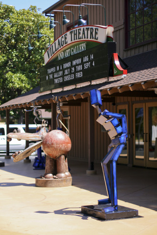 Village_theatre_-_twisted_chiseled_fired_01.slide