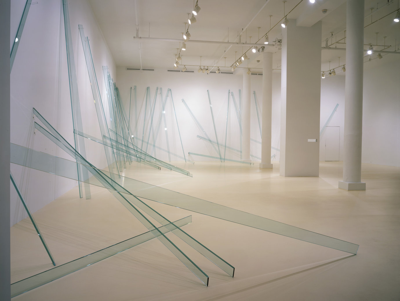 , 2000. 50 glass units, two-way mirror and acrylic, glass: 168" x 4" x 5/8" (426.7 x 10.2 x .63 cm), each
installation dimensions variable.