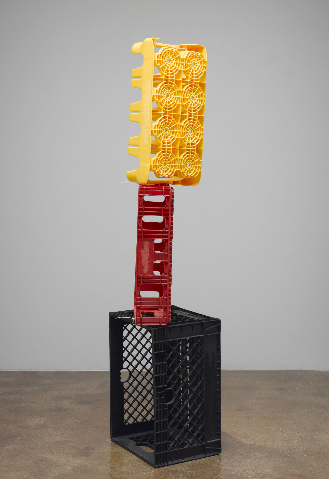 , 2002. Three plastic beverage crates and two nylon cable ties, 56-1/2" x 13" x 13" (143.5 cm x 33 cm x 33 cm), overall installed.