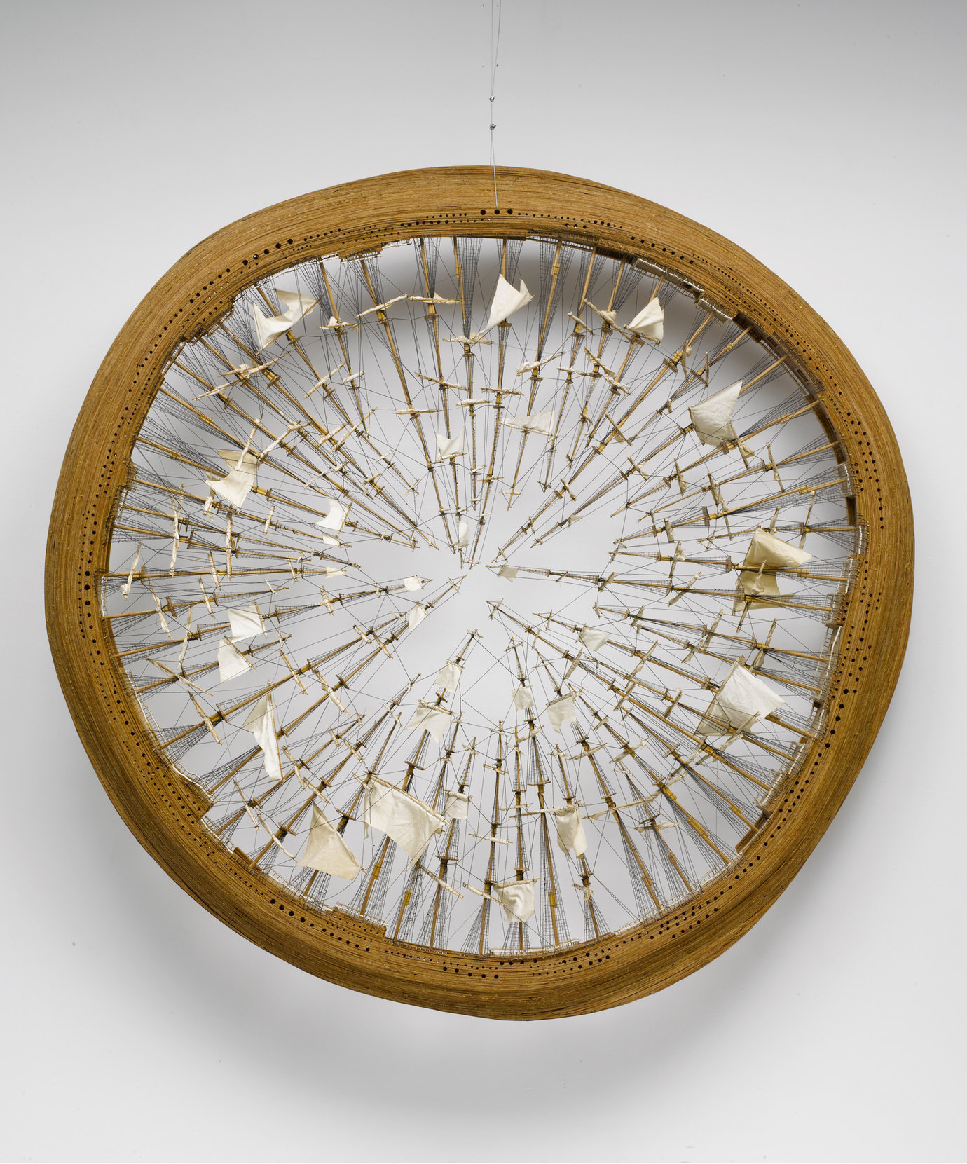 , 1995. Fabric, string, and wood, 90" (228.6 cm) diameter x 10" (25.4 cm).