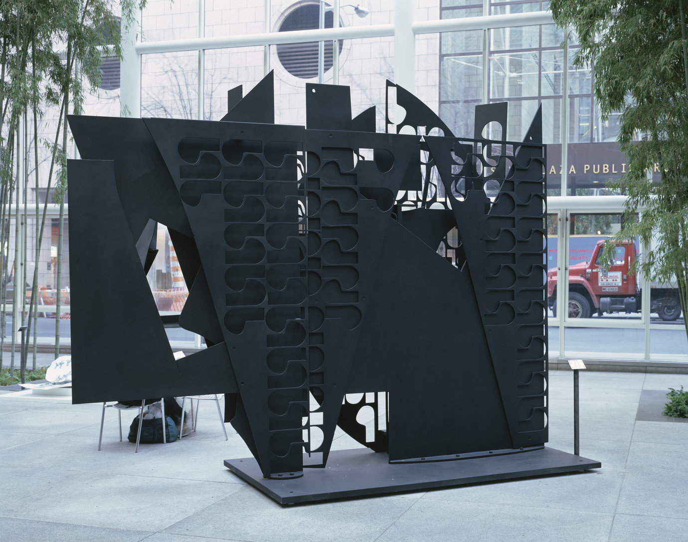 , 1976-80. Cor-ten steel painted black, 11' 6" x 14' 4" x 5' (3.505 m x 4.369 m x 1.524 m).