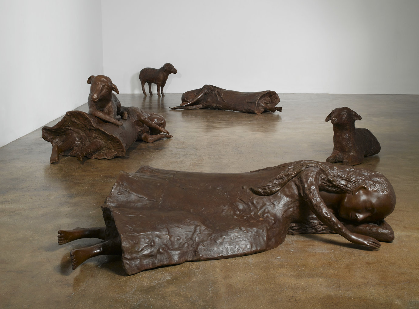 , 2009. Bronze, overall installation dimensions variable
30-1/2" x 13" x 42" (77.5 cm x 33 cm x 106.7 cm), standing sheep
22-1/2" x 40" x 15" (57.2 cm x 101.6 cm x 38.1 cm), resting sheep
34" x 82" x 39" (86.4 cm x 208.3 cm x 99.1 cm), woman with sheep
17-3/4" x 84" .