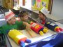 Having fun playing with Torahs at SHAS Preschool