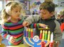 Lighting the menorah at SHAS Preschool