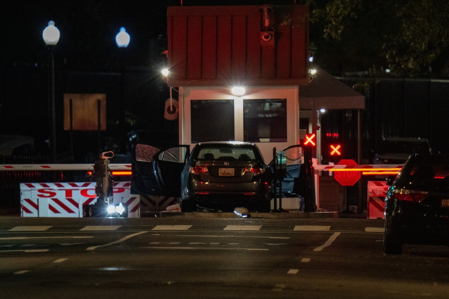 Car crashes into security gate near White House