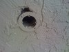 Hole in stucco