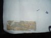 How to get this 'gum' off from textile sticky tape?