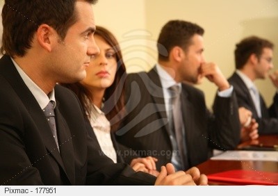 group of business persons at a conference, man in