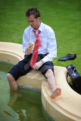 Young Businessman at the Fountainфотография