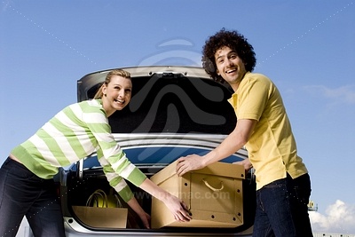 Young Man and Woman at Carфотография