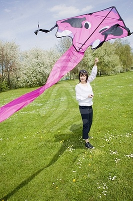Young Woman Kite-Flyingfotografie
