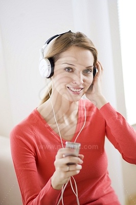 Young Woman Listening Music picture