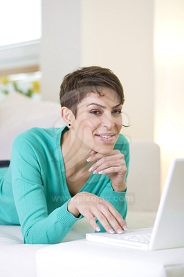 Young Woman Working on PCobraz