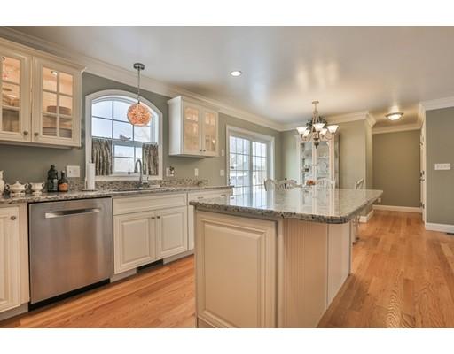 Gorgeous, custom-built, energy efficient, HERS Rated home built in 2013 sited spaciously on over 1 acre of landscaped and open land. The large eat-in kitchen opens onto a spacious deck overlooking a professionally landscaped back yard, wooded area, and farm land. Kitchen includes double ovens, 5-burner gas stove, granite countertops, large granite center island, and stainless appliances. Red oak hardwood flooring is throughout 1st floor. The Master has a large custom walk-in closet, tiled shower and claw foot tub. Additional features are custom closets throughout the home, second floor laundry, gas fireplace, custom crown moldings, 2-zone central heat/AC, 200 amp electric, full basement, and a 2 car attached garage with shelving. Bonus room over the 2-car garage provides extra space for game room, media room, whatever. Custom stone wall, lush lawn, and professional landscaping frame this special property. Close to major commuting routes, commuter rail, and commuter bus station.