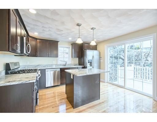 NEW CONSTRUCTION! Very Rarely Offered-Center Entrance Colonial On Quiet Side St Location! This Property Has It All-Hardwood Floors Thru-Out-Sun Filled Front To Back Living Room-Top Of The Line Designer Kitchen Stainless Appliances And Granite Counters & Granite Island-Deck Access Off Of Kitchen-Open Concept Dining Room For Entertaining. First Floor Half Bath With Washer Dryer Hook-Ups. Master Bedroom With His & Hers Closets And Three Quarter Bath. Two Additional Bedrooms And A Full Bath. Basement Just Waiting To Be Finished By New Owner! New High Efficiency Gas Heat-200 AMP Electric-Extra Deep One Car Garage Under And Two Car Driveway Complete The Picture!! Walk To The Beach And Shops!! Be In This Exceptional Home For The Spring!! GREEN CERTIFIED!!
