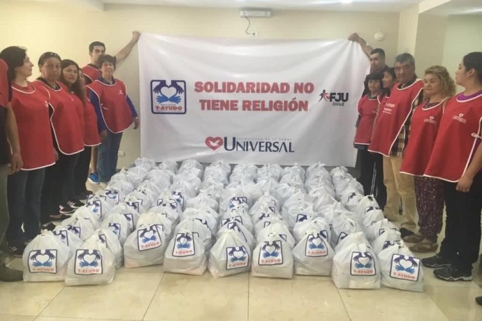 Universal realiza ação social em comunidade carente de Santiago, no Chile