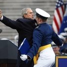 George W. Bush, Caped Crusader And Maker Of Merry George W. Bush, Caped Crusader And Maker Of Merry