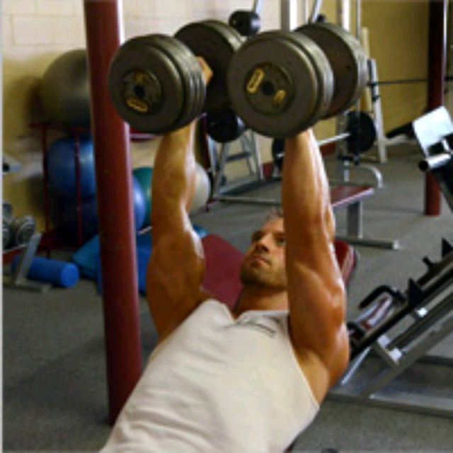 Dumbell Chest Press With Rotation Exercise Howto Workout Trainer