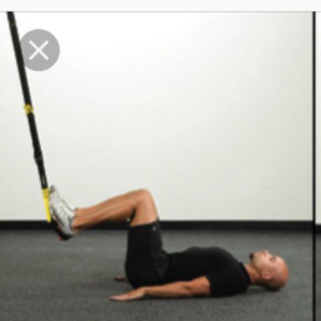 TRX Glute bridge Exercise Howto Workout Trainer by Skimble