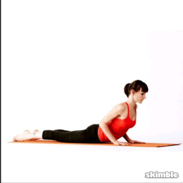 Downward facing dog to Cobra Exercise Howto Workout Trainer by Skimble