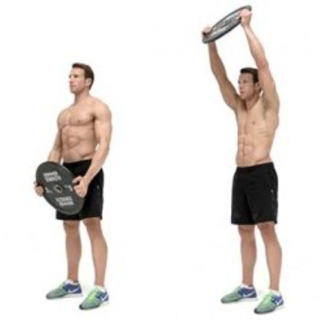 Standing disc raise Exercise Howto Workout Trainer by Skimble