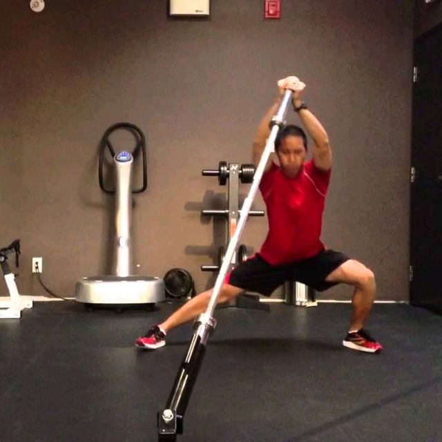 Lateral Landmine Lunge with Overhead Press - Exercise How-to - Workout