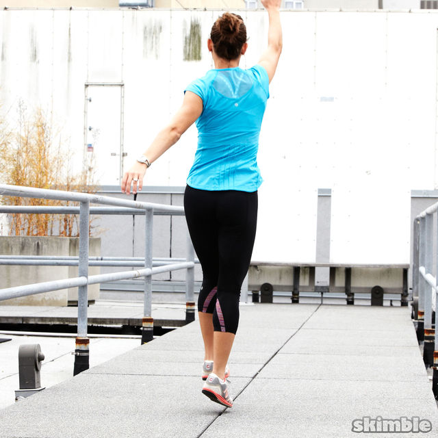 Skips with Backward Arm Circles Exercise Howto Workout Trainer by