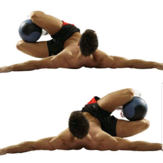 Lying Torso Twists With Ball Exercise Howto Workout Trainer by Skimble