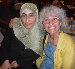 Caption: Manal AlBzoor and Marge Schneider at the iftar in Bridgeport, Conn., Credit: Photo by Craig LeMoult