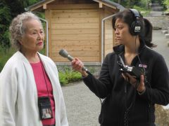 Caption: Mara Kumagai Fink (right) interviewing her great aunt Matsue at Manzanar, the camp she was brought to in northern California.