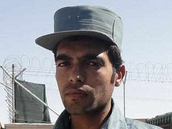 Caption: An Afghanistan National Police trainee., Credit: Steve Zind