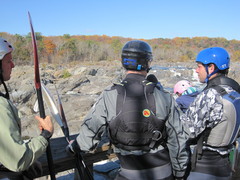 Caption: Rob checks out the rapids at Great Falls with friend Dave Beck and instructor Jim Buley, Credit: Teke Wiggins