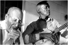 Caption: Sid Hemphill (left) & Lucius Smith, September 1959, Senatobia, MS, Credit: Alan Lomax