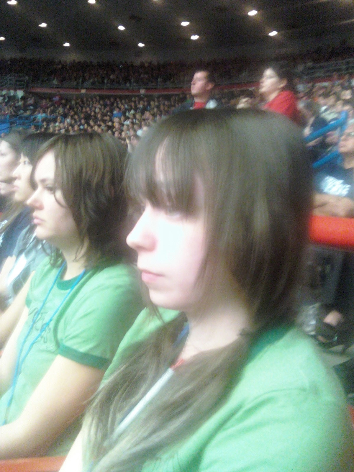 Caption: City High School students Grace and A watch the President, Credit: Sarah Bromer