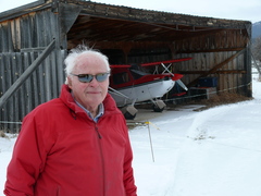 Caption: Ed Musselman and his Plane on his Montana Ranch, Credit: Clay Scott