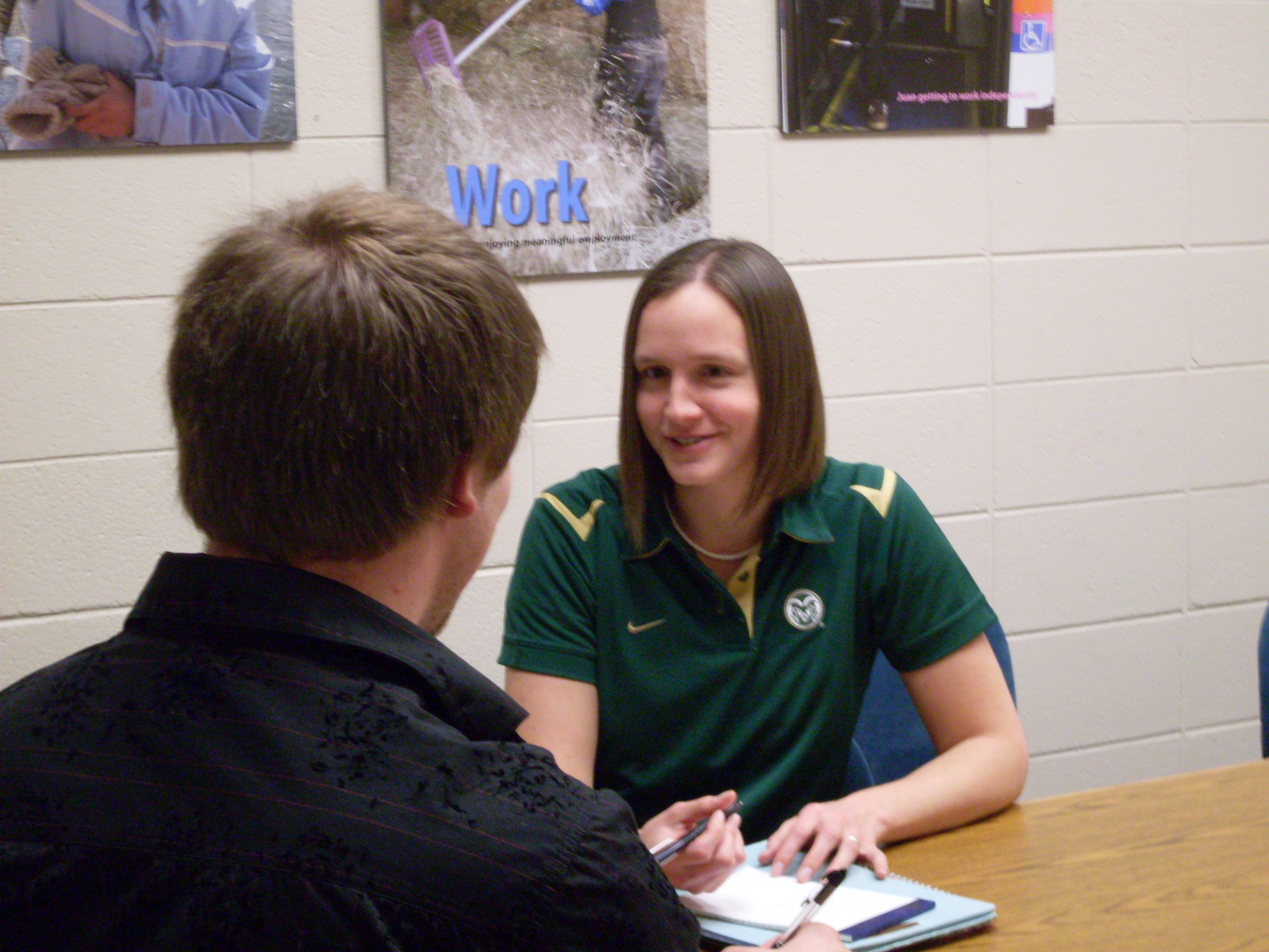 Caption: CSU peer mentor Jane works with Mark, a student with Asperger's Syndrome., Credit: Grace Hood