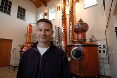 Caption: Greg Koenig and his vodka distillery, Credit: Guy Hand