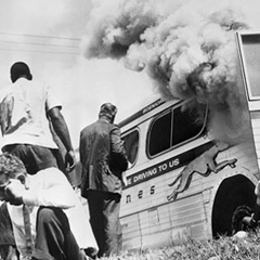 Caption: From May until November 1961, more than 400 black and white Americans risked their lives — and many endured savage beatings and imprisonment — for simply traveling together on buses and trains as they journeyed through the Deep South. Pictured: In Annisto, Credit: Corbis