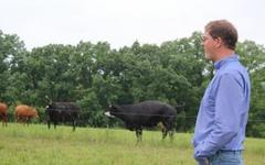 Caption: Ryan Jepsen and his wife started Grass Run Farms in 2006 to sell grass fed beef and hogs. With more demand than they could meet, they began buying from other farmers, and found themselves stepping into the role of local foods middlemen., Credit: Kathleen Masterson/Harvest Public Radio