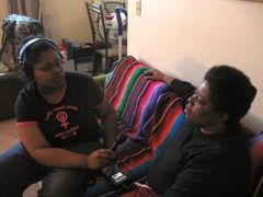 Caption: Valencia McMurray (left) interviews her mother about the attack that nearly took her life when Valencia was 6., Credit: Sasha Aslanian