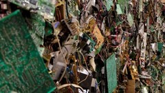 Caption: E-waste circuit boards, Credit: QUEST