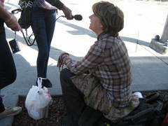 Caption: Weekday High interns interview Lisa, a member of the Rainbow Family. They're a group that meets in national parks to pray for world peace. Lisa is not her real name., Credit: Emma Baker and Delvonte Felder