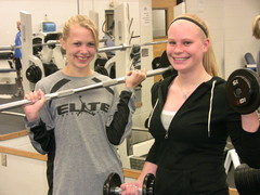 Caption: Molly & CeCe in the weight room