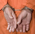 Offender_in_cuffs_small
