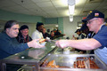 Us_navy_070202-n-8110k-044_sailors_assigned_to_guided_missile_destroyer_uss_mahan__ddg_72__serve_lunch_to_homeless_veterans_at_the_new_england_shelter_for_homeless_veterans_small