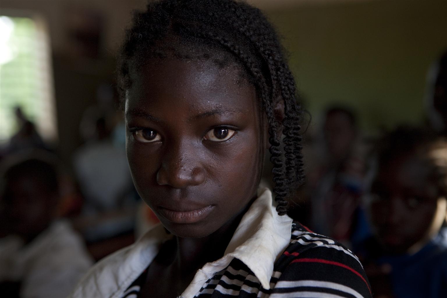 Caption: A girl attends Koulweogo Primary School in Zorgho Village in rural Ganzourgou Province in Plateau-Central Region. Burkina Faso was among the first 18 countries invited to join the Fast Track Initiative (now Global Partnership for Education) as early as Ju, Credit: UNICF Burkina Faso/2011/ Marinovitch