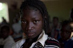 Caption: A girl attends Koulweogo Primary School in Zorgho Village in rural Ganzourgou Province in Plateau-Central Region. Burkina Faso was among the first 18 countries invited to join the Fast Track Initiative (now Global Partnership for Education) as early as Ju, Credit: UNICF Burkina Faso/2011/ Marinovitch