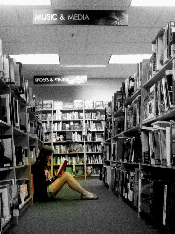 Caption: Teenager, Skye, enjoys a good book at a local book store., Credit: Sydney Cisco 